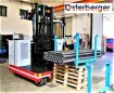 Extremely agile multi-directional reach truck with electric drive and storage platform